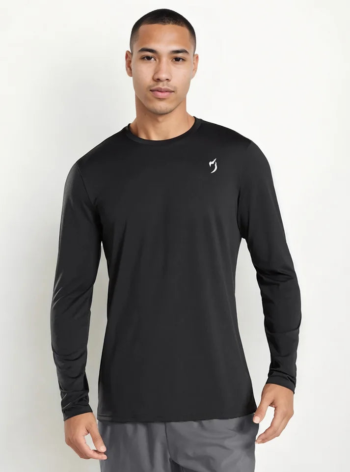 In this image a male model wearing Endurance Full Sleeves T-shirt Black a product from Radowl athleusire wear brand in India, This t-shirt have long sleeve to keep you warm during winters, black colour tshirt with white colour Radowl logo give this t-shirt stylish look.