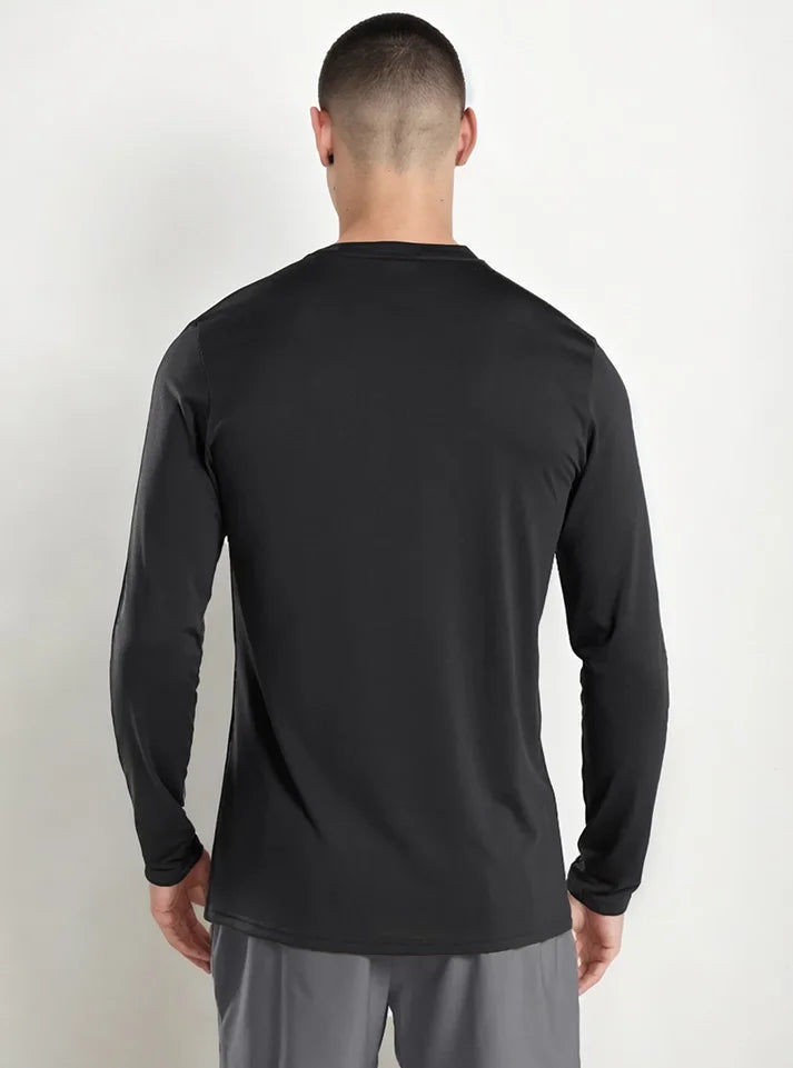 In this image model showing back side of Endurance Full Sleeves T-shirt Black a product from Radowl athleasuire brand in india popular among gymmers.