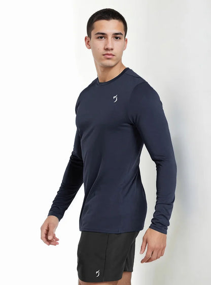 In this image a male model wearing Endurance Full Sleeves T-shirt Navy a product from Radowl gym wear brand, this tee is have full sleeves which is perfect for winter season.