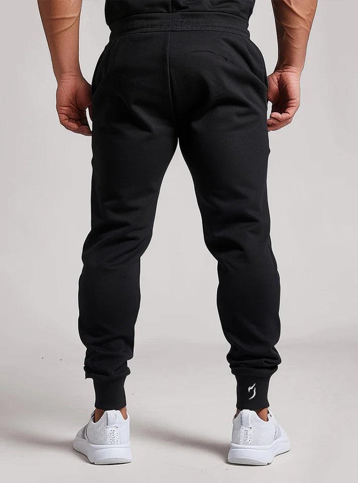 RORF gym trouser for men | Men in jogger pants performing workout exercises, showcasing versatile gym jogging pants with a loose fit, joggers men trousers buy now at radowl