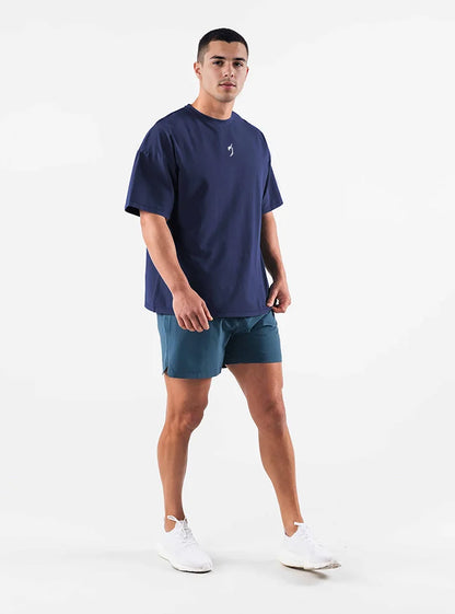 Mens Oversized Gym Tshirt in Navy with RadOwl Logo - Stylish and breathable 100% bio-washed cotton shirt perfect for fitness training and casual wear.