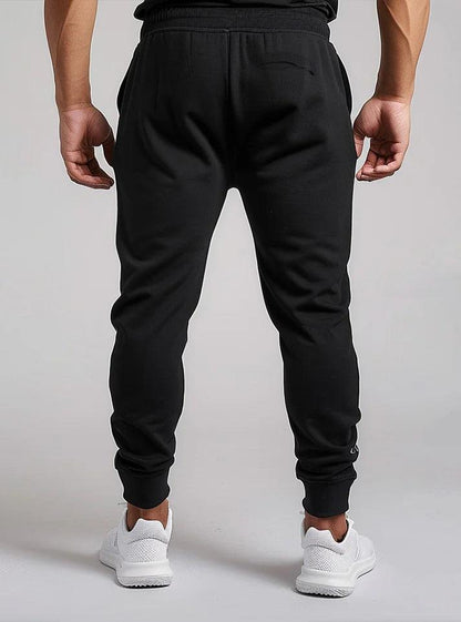 Radowl gym trousers for men - stylish black joggers with white logo, ideal for exercise and casual wear, crafted for increase your output during workouts buy now on radowl.co.in a perfect bottom gym wear for bodybuilders.