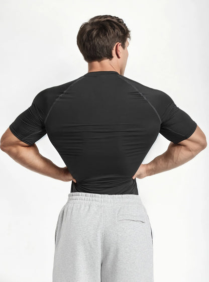 Back side photo of a gym model standing on whitedrop background wearing Titan Flex Radowl half sleeve gym compression tee black for men 