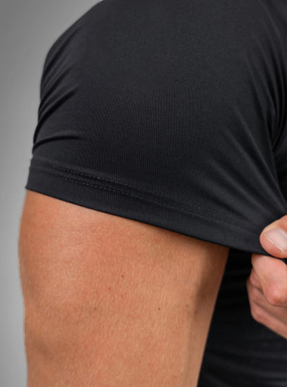 Close up photo photo of Titan Flex Radowl half sleeve gym compresor t-shirt black showing its fabric.