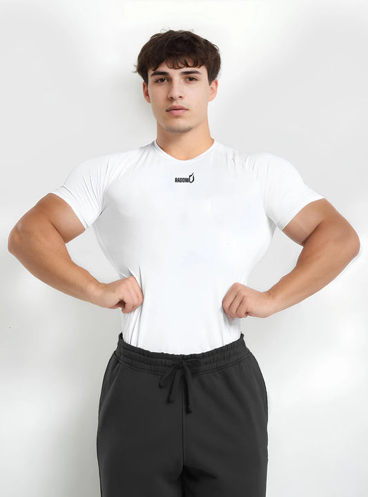 Front photo of fitness male model wearing white colour radowl half sleeve compression tshirt standing whitedrop background.