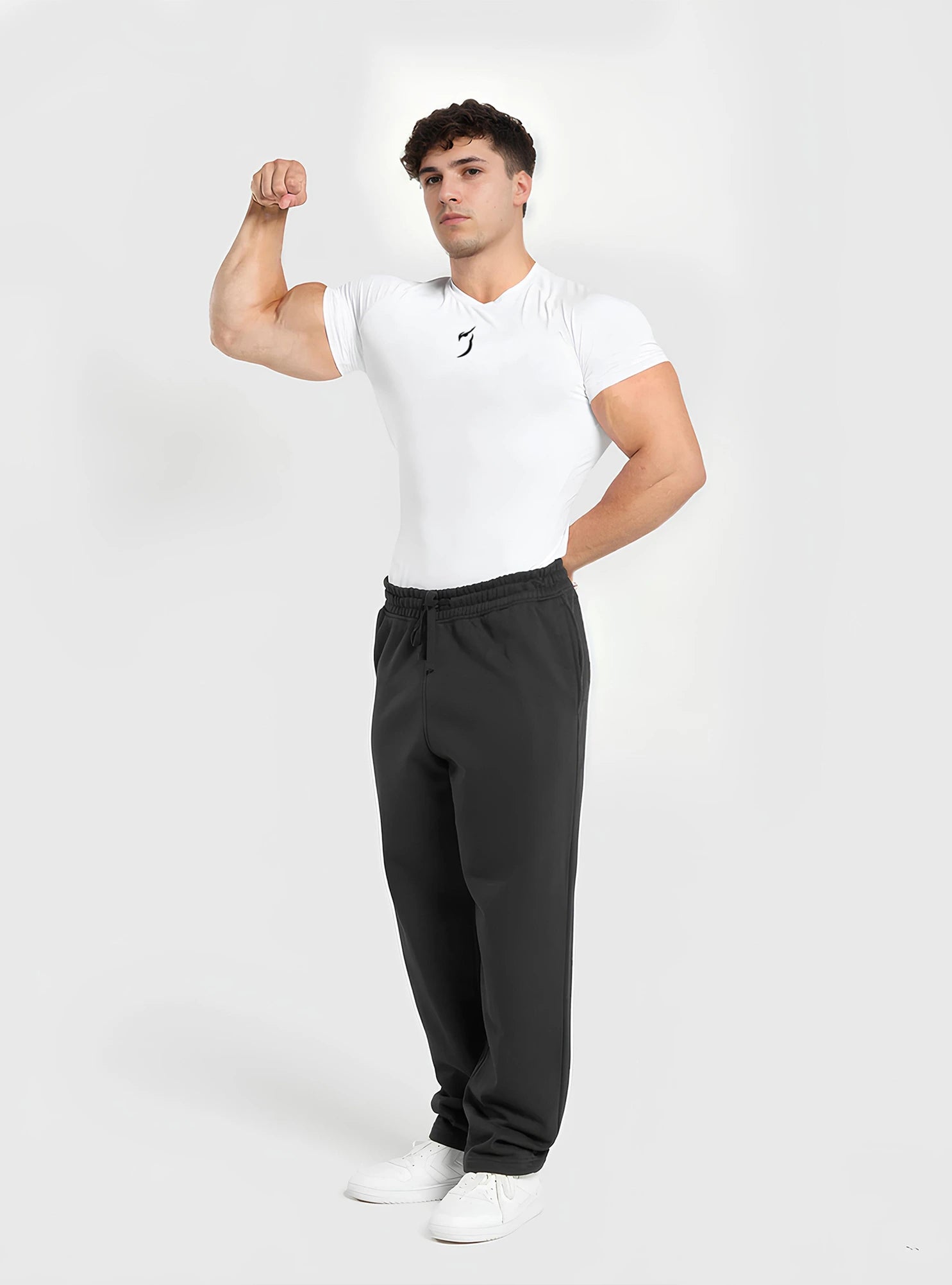 Full Front image of a male fitness model wearing Radowl Embelm white compression tshirt standing on whitedrop background